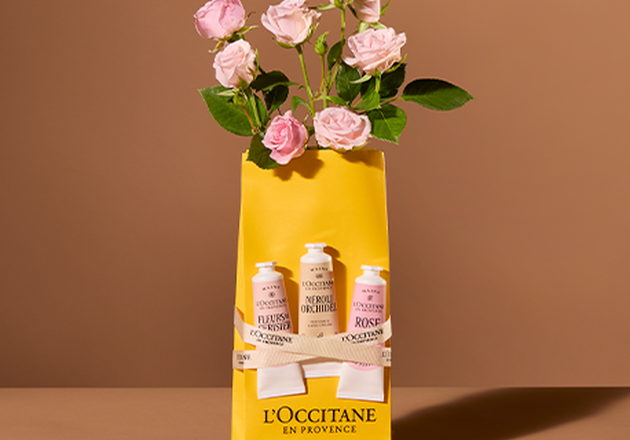 L'OCCITANE gift box with wild flowers containing L'OCCITANE Bonne M&egrave;re Lemon & Tangarine Soap, L'OCCITANE Gentle & Balance Solid Shampoo & L'OCCITANE The Petit Remedy Blam