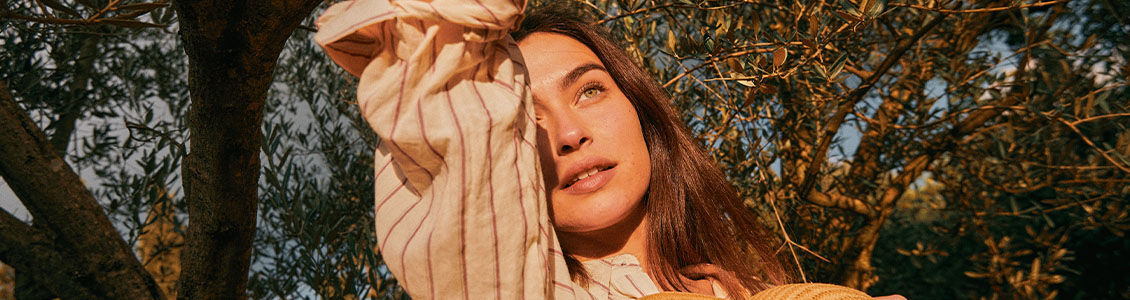 Woman with glowing and radiant skin, L'OCCITANE SKINCARE 