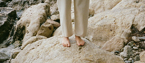 Person standing on rocks  