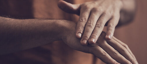 Man applying L&rsquo;OCCITANE Shea Intensive Hand Balm