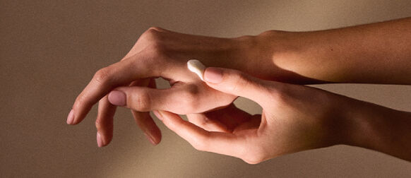 An image showing a hand-drawn heart inside a persons hand