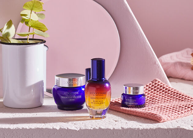 This image shows the L'OCCITANE Immortelle Reset Overnight Serum, L'OCCITANE Immortelle precious cream, L'OCCITANE Immortelle Precious Eye Balm