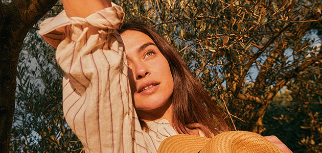 Woman with glowing and radiant skin, L'OCCITANE SKINCARE 