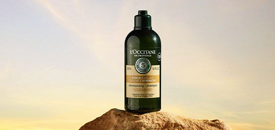 The image shows the L'OCCITANE Volume and Strength Shampoo