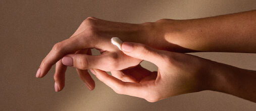 An image showing a hand-drawn heart inside a persons hand