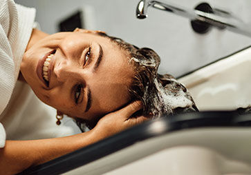 Rinsing Shampoo Out of Hair 