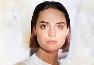 The face of a woman looking straight at the camera