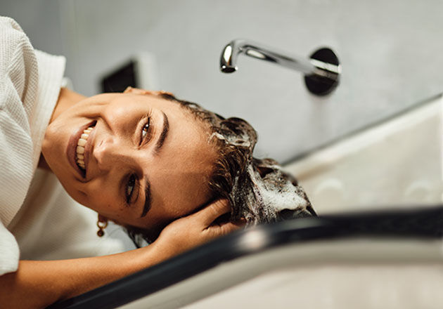 Rinsing Shampoo Out of Hair 