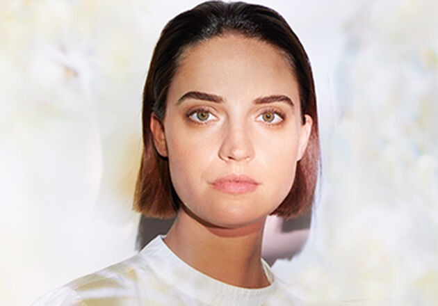 The face of a woman looking straight at the camera