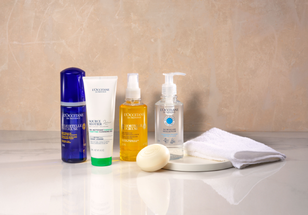This image shows L'OCCITANE cleansers including the L'OCCITANE Precious Essential Water, L'OCCITANE Immortelle Precious Cleansing Oil