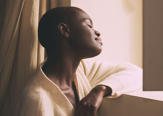 A woman looking through the window
