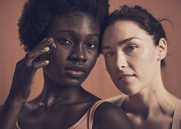 Image shows two women facing the audience