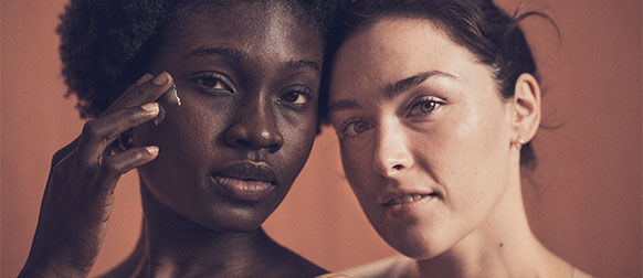 This image shows two women looking at the viewer
